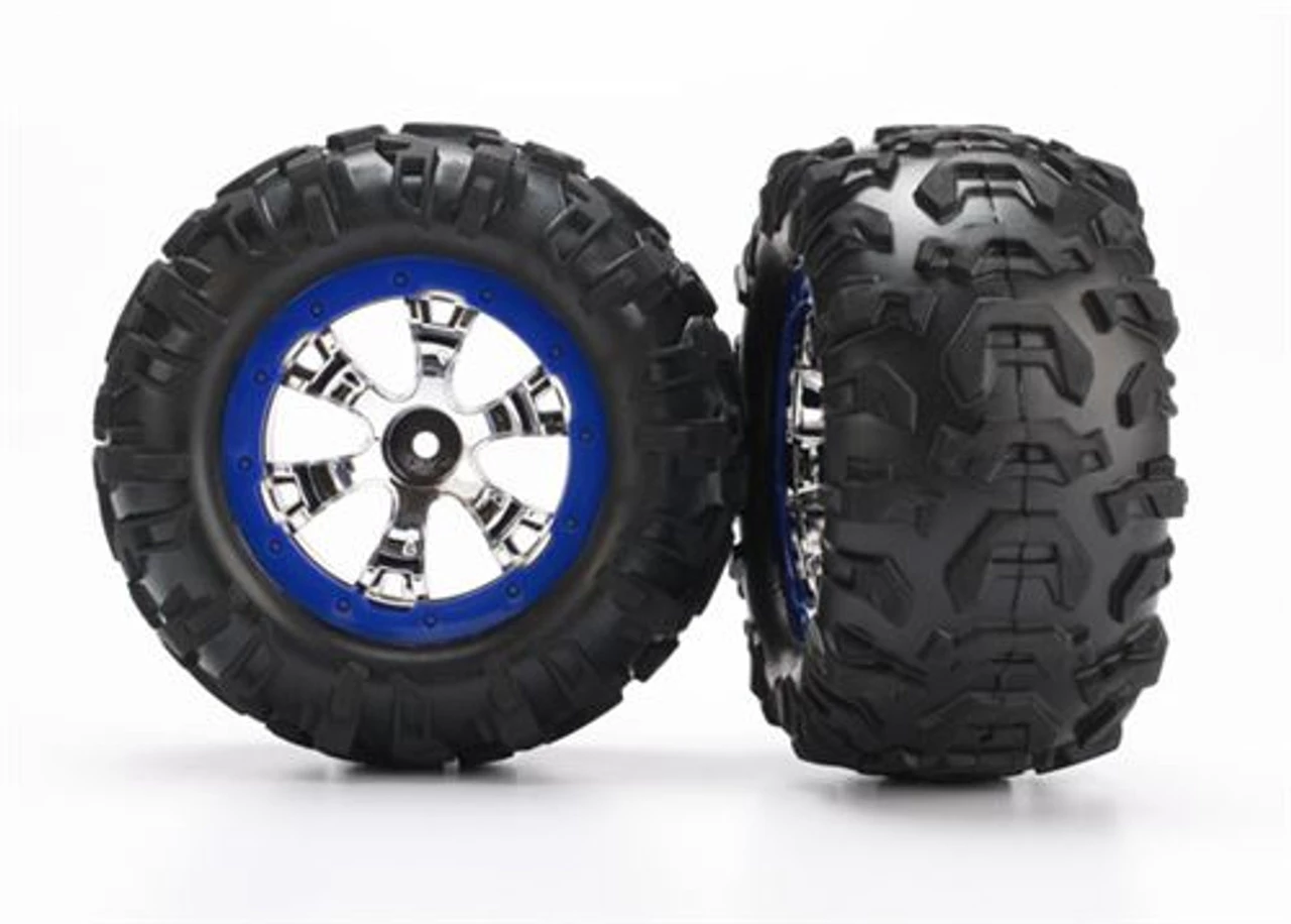 Traxxas Tires and wheels, assembled, glued (Geode chrome, blue beadlock style wheels, Canyon AT tires, foam inserts) (1 left, 1 right) 3 Traxxas Tires and wheels, assembled, glued (Geode chrome, blue beadlock style wheels, Canyon AT tires, foam inserts) (1 left, 1 right)